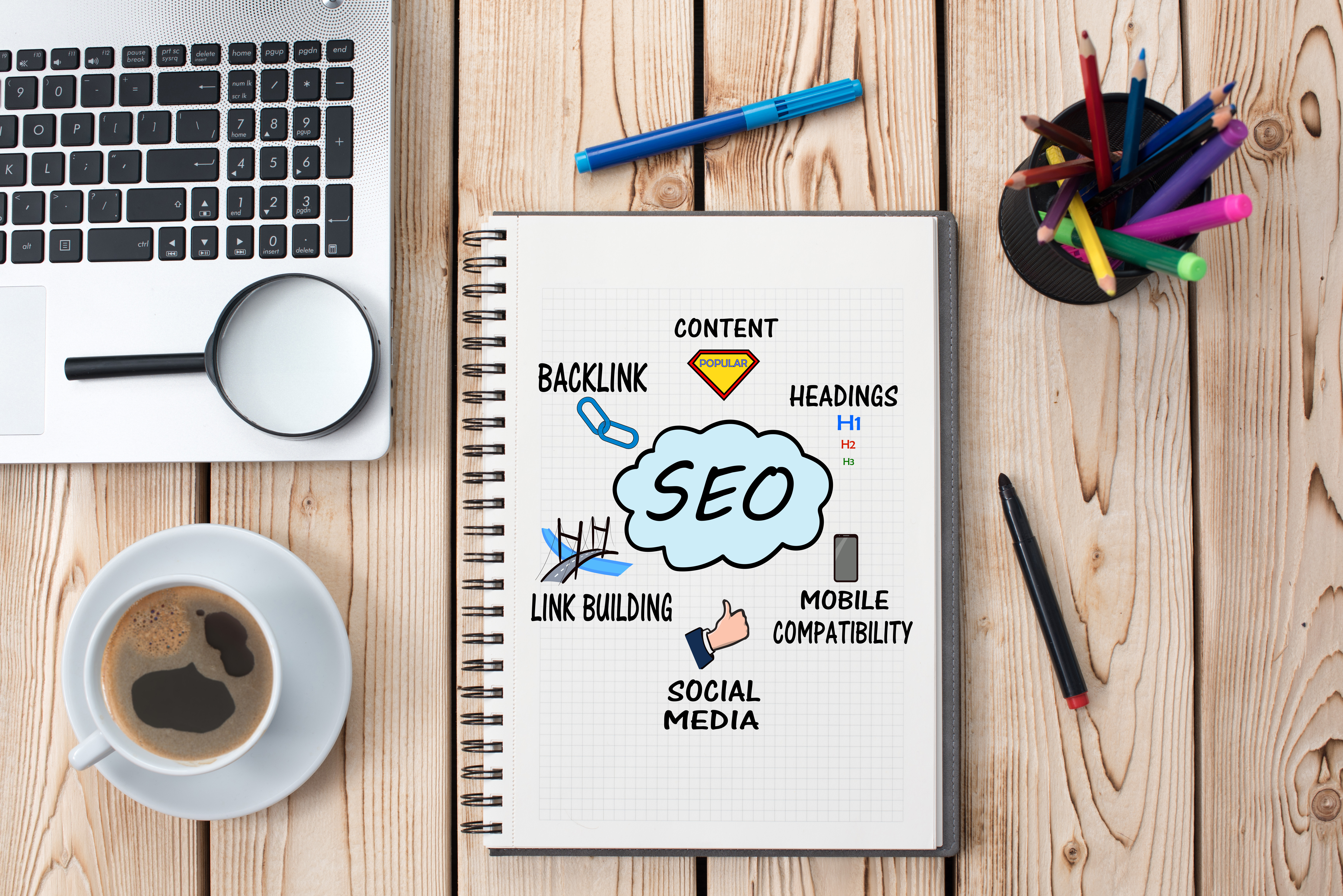 Notebook with search engine optimization topics written down.